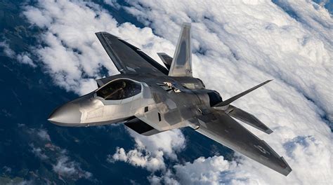 F-22 Raptor with external fuel tanks and missile loadout