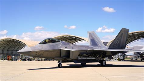 F-22 squadron performing aerial drills