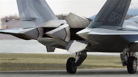 F-22 taking off with thrust vectoring nozzles engaged