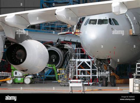 F-22 undergoing maintenance in a hangar
