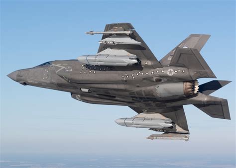 F-35 carrying AIM-260 and AGM-158 missiles on its wing racks