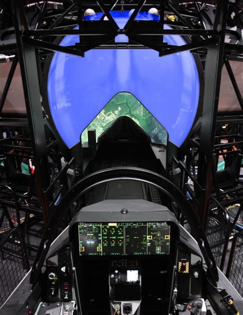 F-35 full mission simulator cockpit interior with pilot training