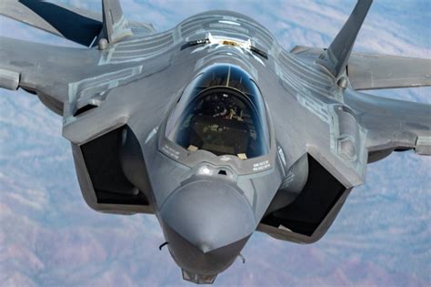 F-35 in NATO formation with Belgium, Netherlands, and Norway
