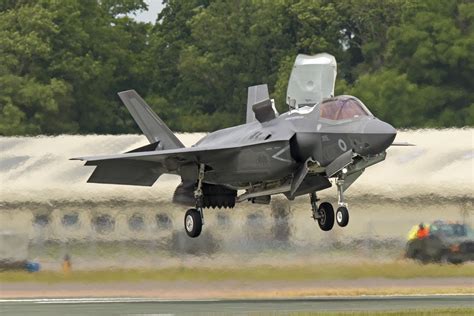 F-35 Lightning II banking steeply during combat readiness drill