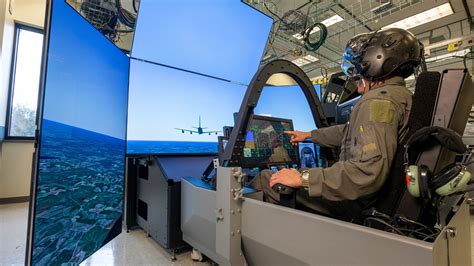 F-35 pilot training in full mission simulator cockpit environment