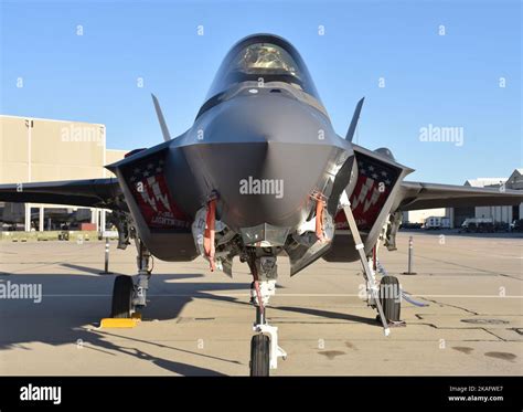 f-35a joint strike fighter in flight over desert terrain