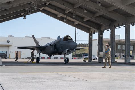 F-35A Lightning II landing at Kadena Air Base during combat readiness rotation