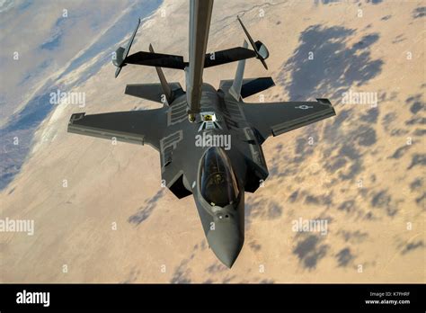F-35A refueling mid-air over Nevada desert during endurance exercise 2024