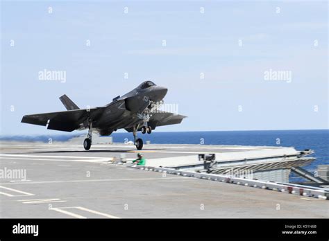 f-35c landing aboard uss abraham lincoln during carrier qualifications