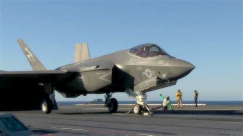 F-35C Lightning II launching from aircraft carrier catapult