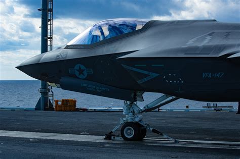 F-35C Lightning II launching from US Navy aircraft carrier at sea