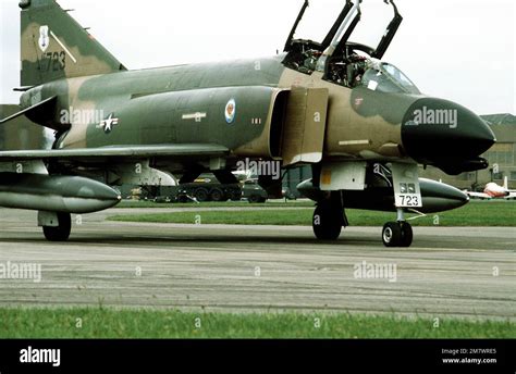 F-4 Phantom II carrying heavy external weapons load during military exercise