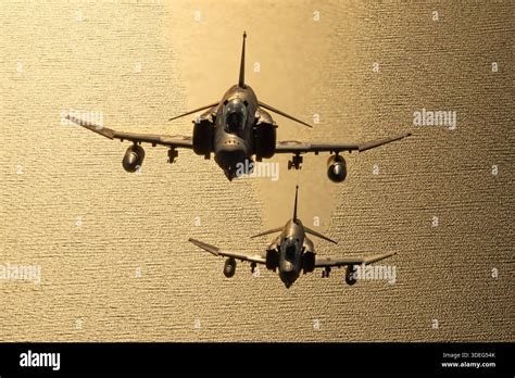 F-4 Phantom II over Vietnam with twin J79 engines and underwing weapons