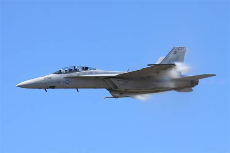 F/A-18 Hornet executing a high-speed pass during a training exercise