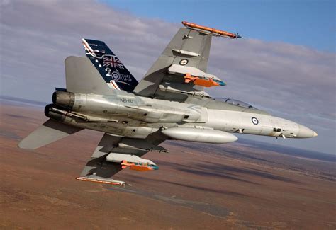 F/A-18 Hornet in formation with Australian and Canadian Air Force aircraft