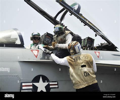F/A-18 Super Hornet launching countermeasure decoys during training exercise