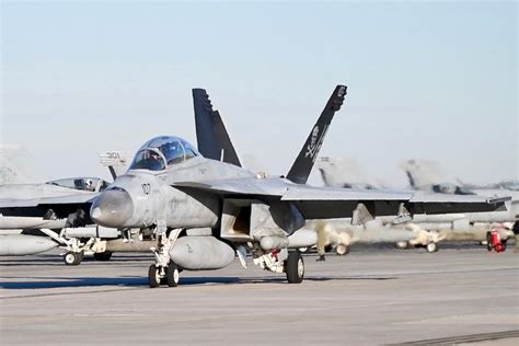 F-A-18 Super Hornet launching from NAS Oceana runway
