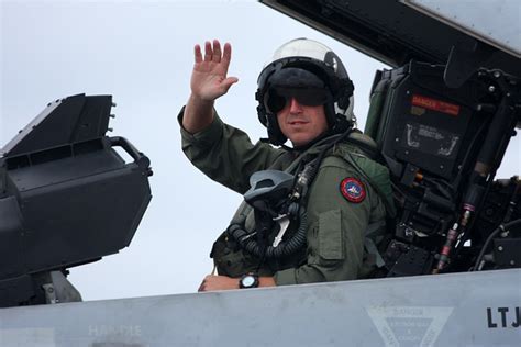 f/a-18 super hornet pilot preparing for high-g combat mission