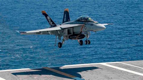 F/A-18 Super Hornet with mixed payload during naval takeoff