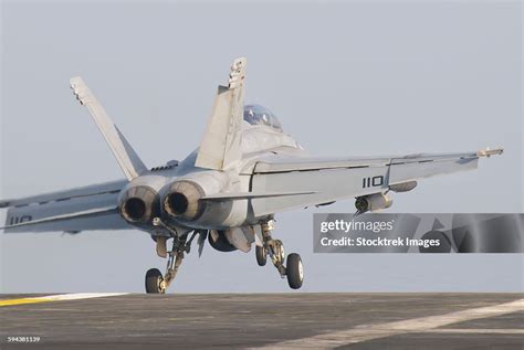 F/A-18F Super Hornet taking off from USS Nimitz deck during routine patrol