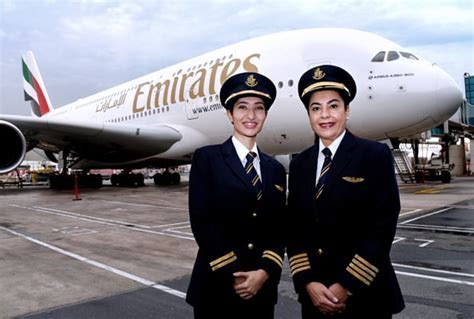 female engineers and pilots at Emirates hangar in Dubai