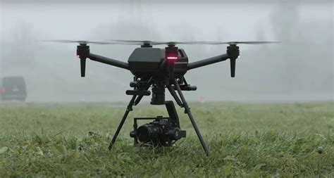 filmmaking drone hovering with mounted RED cinema camera