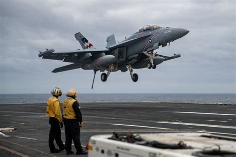 Fleet of EA-18G Growlers and F/A-18 Super Hornets operating from an aircraft carrier