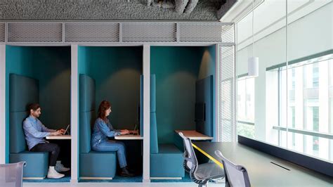 flexible traveler using flight comparison tools on laptop in co-working space