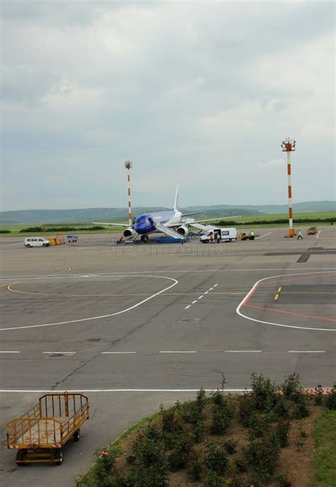 flyone aircraft at chisinau airport preparing for naples flight