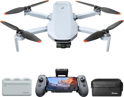 Foldable Potensic ATOM drone with controller, ready for outdoor adventure