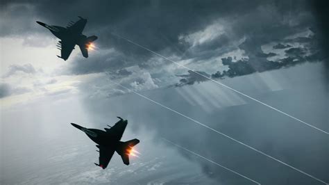 formation flight of Eurofighter Typhoons with afterburners lit at dusk
