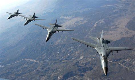 Four Royal Australian Air Force F-111s flying during Red Flag 2006 over Nellis AFB, USA