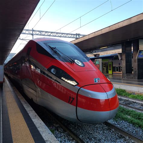 Frecciarossa high-speed train at an Italian station, representing services from Fiumicino