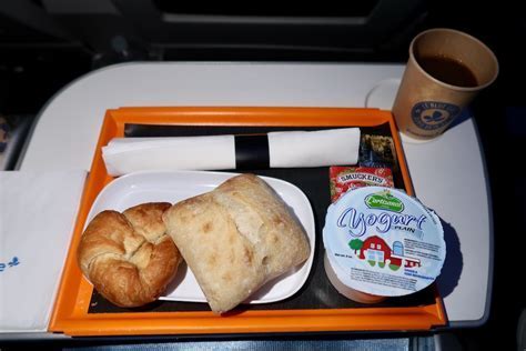 french bee premium meal tray with wine and bread on tray table