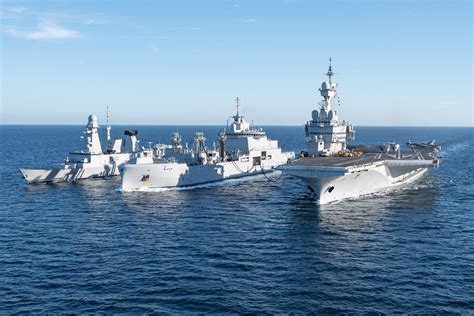 French Navy escort frigate sailing alongside Charles de Gaulle carrier strike group