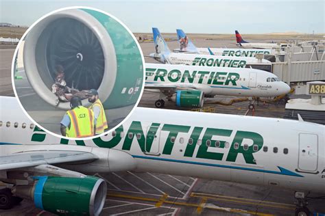 Frontier Airlines passenger service counter handling a flight disruption