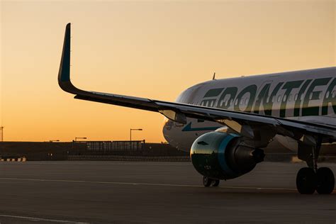 frontier and spirit aircraft at near-empty gates during travel slowdown