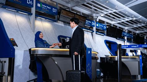 frustrated passengers at arkia israel airlines check-in counter