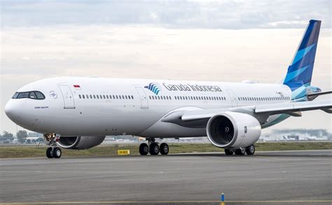 garuda indonesia airbus a330neo taxiing at denpasar airport
