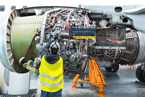 GE Aerospace MRO technicians working on GE9X maintenance tools and diagnostics