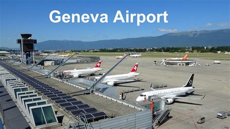 Geneva Airport terminal with snow-capped Alps in the background