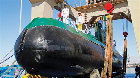 Ghadir class mini submarine navigating shallow coastal waters