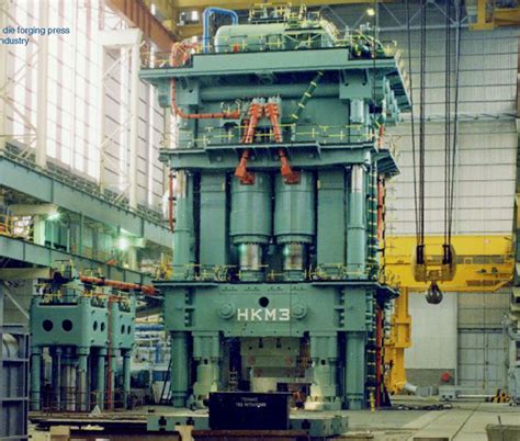 giant aerospace hydraulic forging press inside Safran factory