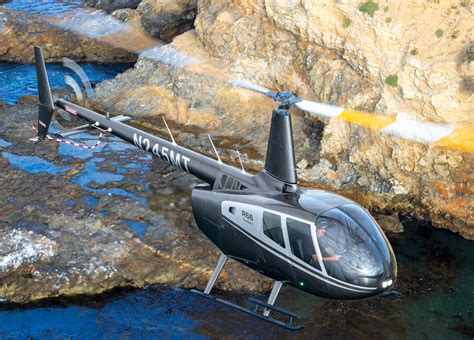 gigi chao flying robinson helicopter in new zealand alpine range