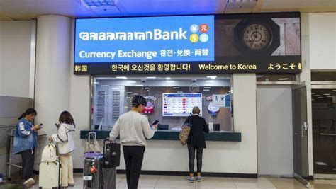 global atm and currency exchange counter inside incheon airport terminal 1