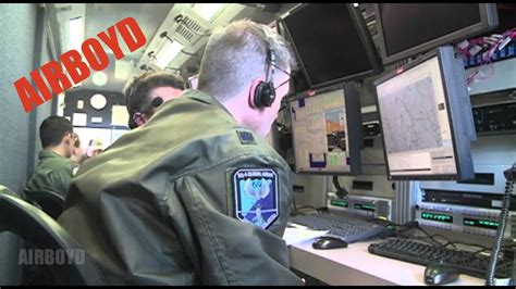 Global Hawk drone operators inside Mission Control Element station