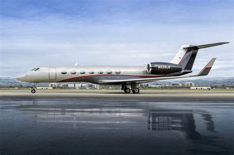 Government-configured Gulfstream G550 on tarmac with aerial surveillance modules