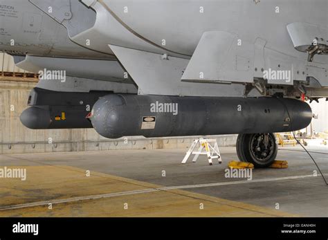 Ground crew prepping F-15I Ra’am with Spice bombs and electronic warfare pods at Hatzerim Airbase