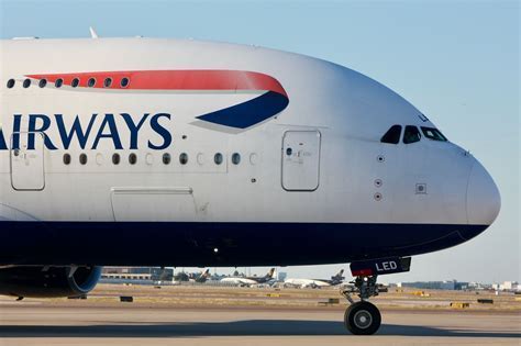 Ground engineers inspecting British Airways Boeing 777 after emergency incident involving cabin fumes