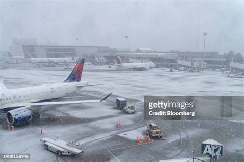 grounded aircraft at boston logan airport during snowstorm